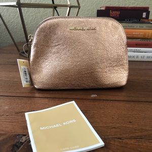 NWT Michael Kors rose gold leather makeup pouch
